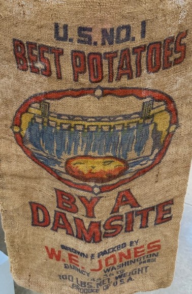 Potato sack with text "U.S. No. 1 Best Potatoes by a Damsite"